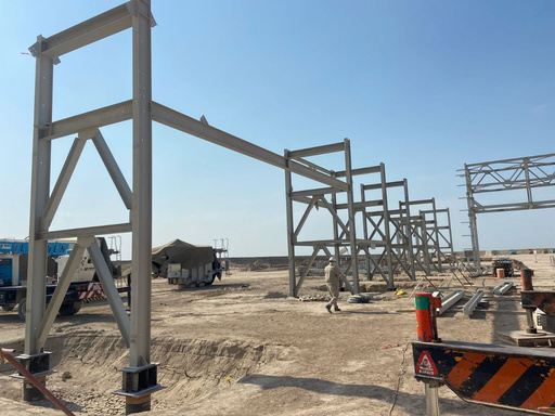 Large steel structure frames arranged on site